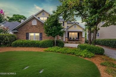 Perfectly positioned along the 7th hole of the prestigious on Porters Neck Country Club in North Carolina - for sale on GolfHomes.com, golf home, golf lot