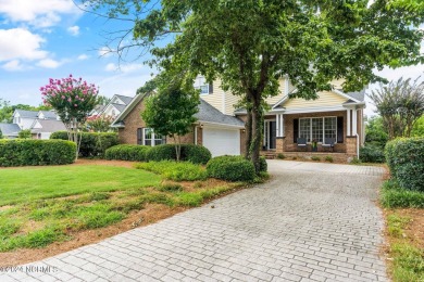 Perfectly positioned along the 7th hole of the prestigious on Porters Neck Country Club in North Carolina - for sale on GolfHomes.com, golf home, golf lot
