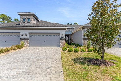 This exclusive four-bedroom townhome in the gated Plantation Bay on Plantation Bay Golf and Country Club in Florida - for sale on GolfHomes.com, golf home, golf lot