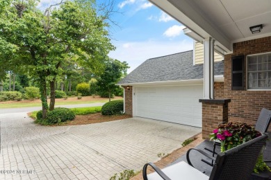 Perfectly positioned along the 7th hole of the prestigious on Porters Neck Country Club in North Carolina - for sale on GolfHomes.com, golf home, golf lot