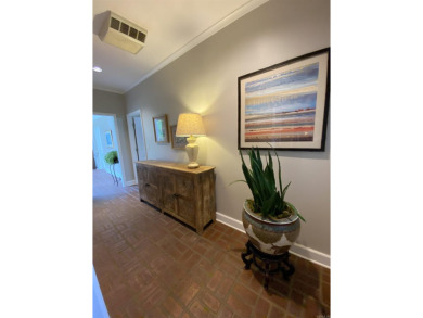 This stunning custom-built 4-bedroom home is perfectly situated on Helena Country Club in Arkansas - for sale on GolfHomes.com, golf home, golf lot