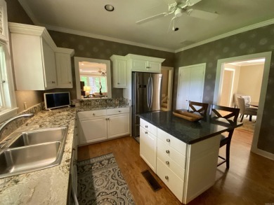This stunning custom-built 4-bedroom home is perfectly situated on Helena Country Club in Arkansas - for sale on GolfHomes.com, golf home, golf lot