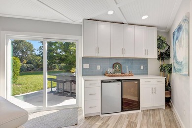 This One of a Kind Fully Renovated 5 Bedroom, 4 Bath Pool Home on BallenIsles Golf and Country Club in Florida - for sale on GolfHomes.com, golf home, golf lot