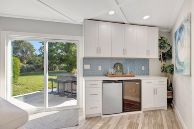 This One of a Kind Fully Renovated 5 Bedroom, 4 Bath Pool Home on BallenIsles Golf and Country Club in Florida - for sale on GolfHomes.com, golf home, golf lot