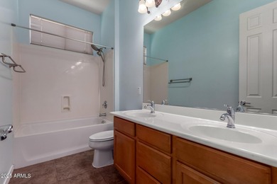 Welcome to a meticulously maintained, legacy-built Pulte home on Poston Butte Golf Club in Arizona - for sale on GolfHomes.com, golf home, golf lot