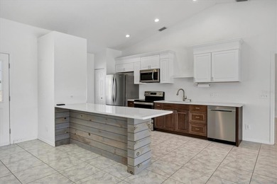 Unique opportunity to own a triplex featuring a spacious on Rotonda Golf and Country Club The Palms Course in Florida - for sale on GolfHomes.com, golf home, golf lot