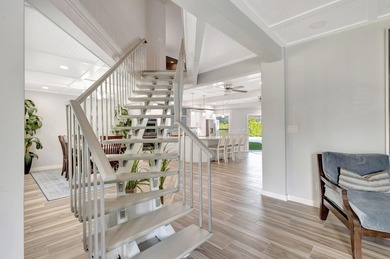 This One of a Kind Fully Renovated 5 Bedroom, 4 Bath Pool Home on BallenIsles Golf and Country Club in Florida - for sale on GolfHomes.com, golf home, golf lot