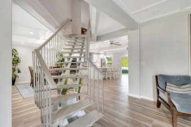 This One of a Kind Fully Renovated 5 Bedroom, 4 Bath Pool Home on BallenIsles Golf and Country Club in Florida - for sale on GolfHomes.com, golf home, golf lot