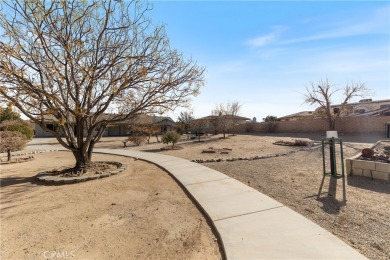 This stunning single story 4 BR/2.5 BA, 3,271 sq. ft on Apple Valley Country Club in California - for sale on GolfHomes.com, golf home, golf lot