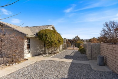 This stunning single story 4 BR/2.5 BA, 3,271 sq. ft on Apple Valley Country Club in California - for sale on GolfHomes.com, golf home, golf lot