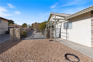 This stunning single story 4 BR/2.5 BA, 3,271 sq. ft on Apple Valley Country Club in California - for sale on GolfHomes.com, golf home, golf lot