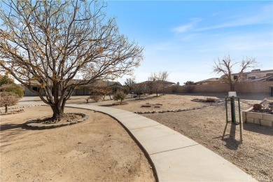 This stunning single story 4 BR/2.5 BA, 3,271 sq. ft on Apple Valley Country Club in California - for sale on GolfHomes.com, golf home, golf lot