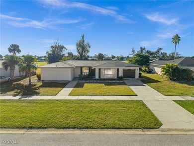 Beautifully updated pool home located on a golf course, offering on Rotonda Golf and Country Club The Hills Course in Florida - for sale on GolfHomes.com, golf home, golf lot