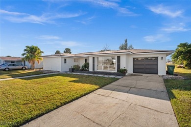 Beautifully updated pool home located on a golf course, offering on Rotonda Golf and Country Club The Hills Course in Florida - for sale on GolfHomes.com, golf home, golf lot