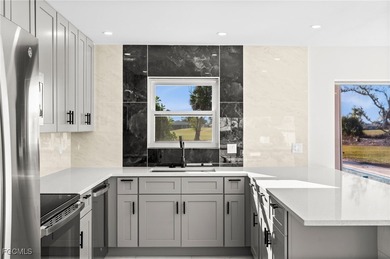 Beautifully updated pool home located on a golf course, offering on Rotonda Golf and Country Club The Hills Course in Florida - for sale on GolfHomes.com, golf home, golf lot