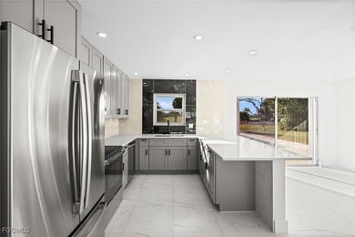 Beautifully updated pool home located on a golf course, offering on Rotonda Golf and Country Club The Hills Course in Florida - for sale on GolfHomes.com, golf home, golf lot