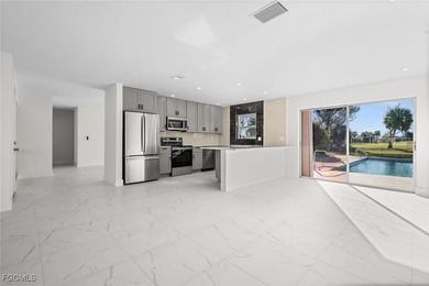 Beautifully updated pool home located on a golf course, offering on Rotonda Golf and Country Club The Hills Course in Florida - for sale on GolfHomes.com, golf home, golf lot