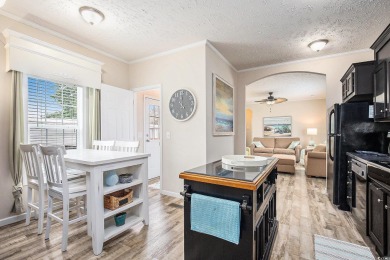 Welcome to this two-bedroom, two-bathroom home in the Waterway on Barefoot Resort and Golf Club  in South Carolina - for sale on GolfHomes.com, golf home, golf lot