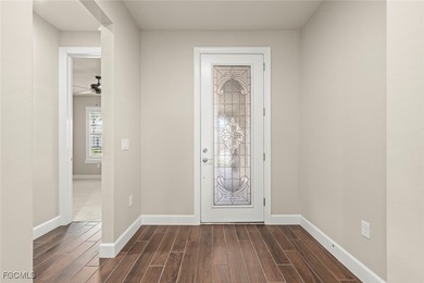 This Immaculate Summerwood home invites comfort, luxury, and on The Plantation Golf and Country Club in Florida - for sale on GolfHomes.com, golf home, golf lot