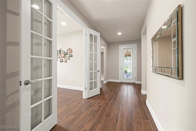 This Immaculate Summerwood home invites comfort, luxury, and on The Plantation Golf and Country Club in Florida - for sale on GolfHomes.com, golf home, golf lot