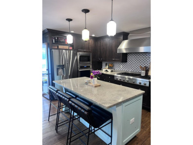 Introducing an exquisite 5-bedroom, 4-bathroom family residence on Timber Ridge Golf Club in Wisconsin - for sale on GolfHomes.com, golf home, golf lot
