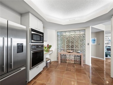 Experience refined bayfront living in this spacious 3BR/2BA, 2 on Longboat Key Golf Club Resort in Florida - for sale on GolfHomes.com, golf home, golf lot