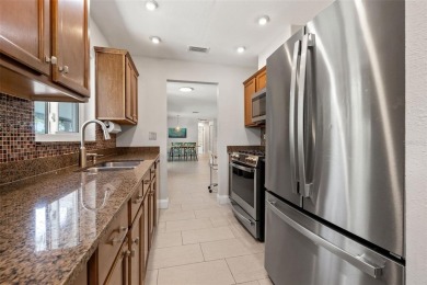 Welcome to 5523 18th St. NE, where elevated living meets on Mangrove Bay Golf Course in Florida - for sale on GolfHomes.com, golf home, golf lot