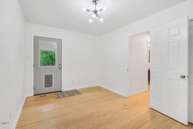 Discover your tranquil retreat in this stylish 3-bedroom on Twin Lakes Golf Course in North Carolina - for sale on GolfHomes.com, golf home, golf lot