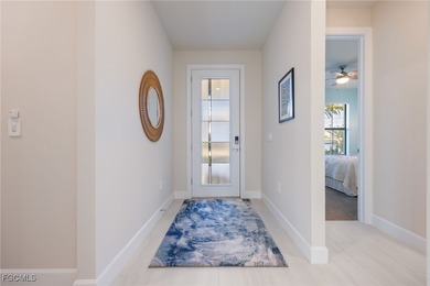 Stunning pool home with peaceful lanai retreat nestled in the on River Hall Country Club in Florida - for sale on GolfHomes.com, golf home, golf lot