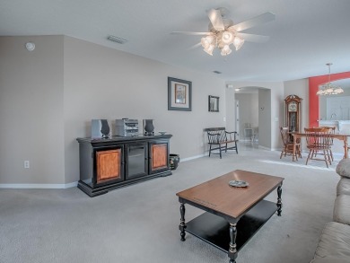 Welcome to your dream home, where comfort meets an active on The Links of Spruce Creek in Florida - for sale on GolfHomes.com, golf home, golf lot