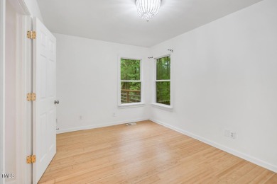 Discover your tranquil retreat in this stylish 3-bedroom on Twin Lakes Golf Course in North Carolina - for sale on GolfHomes.com, golf home, golf lot