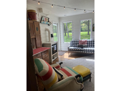 Introducing an exquisite 5-bedroom, 4-bathroom family residence on Timber Ridge Golf Club in Wisconsin - for sale on GolfHomes.com, golf home, golf lot