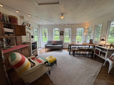 Introducing an exquisite 5-bedroom, 4-bathroom family residence on Timber Ridge Golf Club in Wisconsin - for sale on GolfHomes.com, golf home, golf lot
