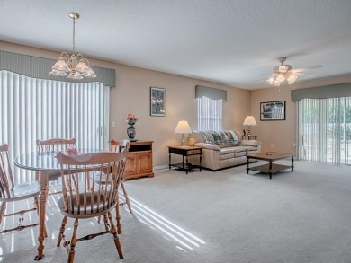 Welcome to your dream home, where comfort meets an active on The Links of Spruce Creek in Florida - for sale on GolfHomes.com, golf home, golf lot