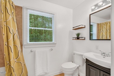 Discover your tranquil retreat in this stylish 3-bedroom on Twin Lakes Golf Course in North Carolina - for sale on GolfHomes.com, golf home, golf lot
