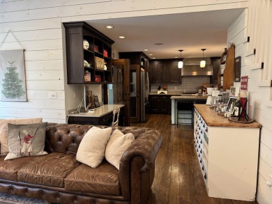 Introducing an exquisite 5-bedroom, 4-bathroom family residence on Timber Ridge Golf Club in Wisconsin - for sale on GolfHomes.com, golf home, golf lot