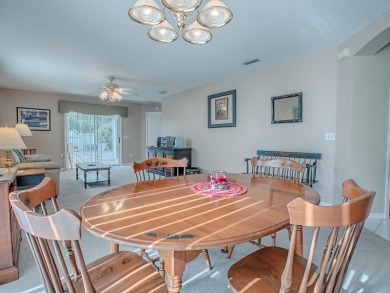 Welcome to your dream home, where comfort meets an active on The Links of Spruce Creek in Florida - for sale on GolfHomes.com, golf home, golf lot