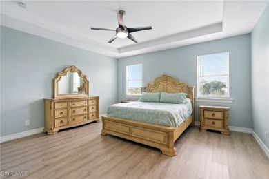 This 5 bed, 4.5 bath home sits in a quiet cul-de-sac in the on Royal Tee Country Club in Florida - for sale on GolfHomes.com, golf home, golf lot