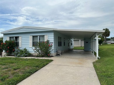 55+ Gated golf course community. Well maintained 2 bedroom 2 on Zellwood Station Country Club in Florida - for sale on GolfHomes.com, golf home, golf lot