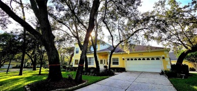 This stunning home is nestled in the gated community of Forest on Innisbrook Resort and Golf Club in Florida - for sale on GolfHomes.com, golf home, golf lot