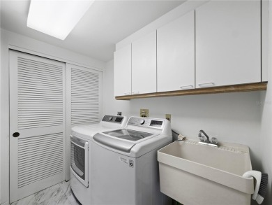 Experience refined bayfront living in this spacious 3BR/2BA, 2 on Longboat Key Golf Club Resort in Florida - for sale on GolfHomes.com, golf home, golf lot