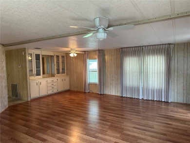 55+ Gated golf course community. Well maintained 2 bedroom 2 on Zellwood Station Country Club in Florida - for sale on GolfHomes.com, golf home, golf lot