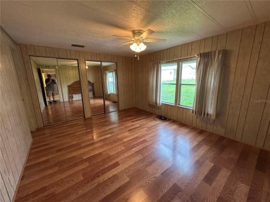 55+ Gated golf course community. Well maintained 2 bedroom 2 on Zellwood Station Country Club in Florida - for sale on GolfHomes.com, golf home, golf lot