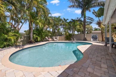 Welcome to 5523 18th St. NE, where elevated living meets on Mangrove Bay Golf Course in Florida - for sale on GolfHomes.com, golf home, golf lot