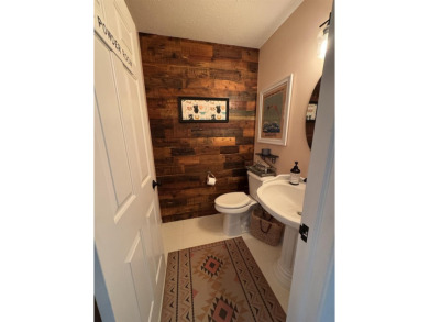 Introducing an exquisite 5-bedroom, 4-bathroom family residence on Timber Ridge Golf Club in Wisconsin - for sale on GolfHomes.com, golf home, golf lot