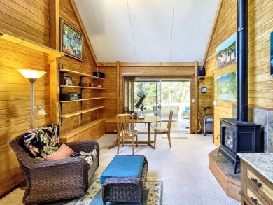 Situated in the lush serenity of Volcano Golf Course on Volcano Golf and Country Club in Hawaii - for sale on GolfHomes.com, golf home, golf lot