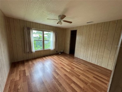 55+ Gated golf course community. Well maintained 2 bedroom 2 on Zellwood Station Country Club in Florida - for sale on GolfHomes.com, golf home, golf lot