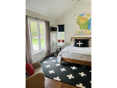 Introducing an exquisite 5-bedroom, 4-bathroom family residence on Timber Ridge Golf Club in Wisconsin - for sale on GolfHomes.com, golf home, golf lot