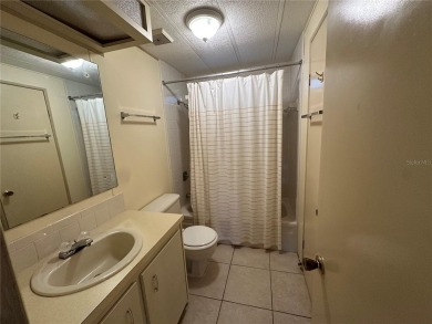 55+ Gated golf course community. Well maintained 2 bedroom 2 on Zellwood Station Country Club in Florida - for sale on GolfHomes.com, golf home, golf lot