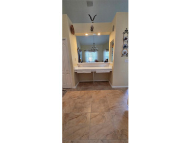 This stunning home is nestled in the gated community of Forest on Innisbrook Resort and Golf Club in Florida - for sale on GolfHomes.com, golf home, golf lot